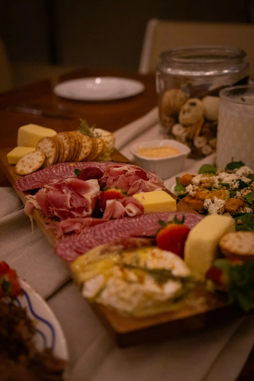 Grazing board of cured meats, cheeses and share plates from the galley aboard VOYŌ